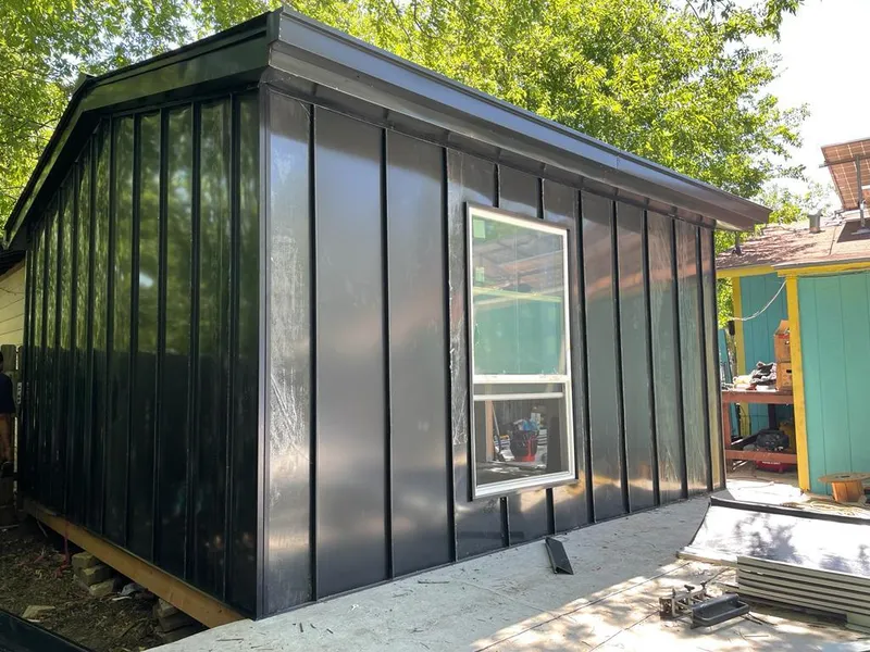 Black standing seam metal wall panels for Metal Roof Installation in Hinsdale