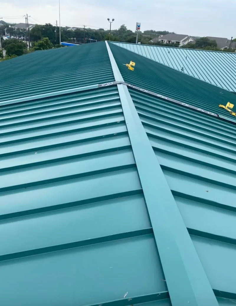 Green commercial metal roof ridge and valley for Metal Roof Repair in Hinsdale