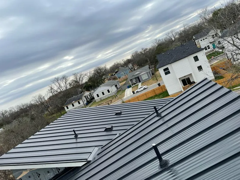 Standing seam metal roof panels with vents for Skylight Repair in Hinsdale